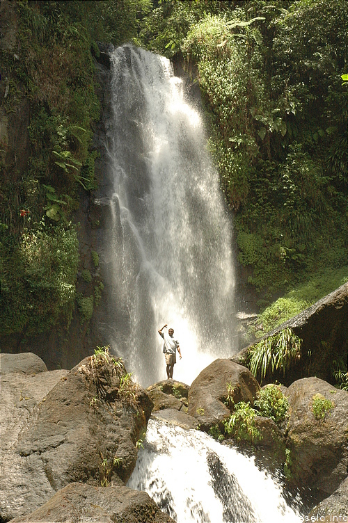 Photography. 510 caribbean man reached huge waterfall