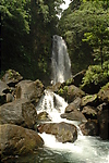 Photography #16: 540 waterfall milk water runs through black volcanic rocks